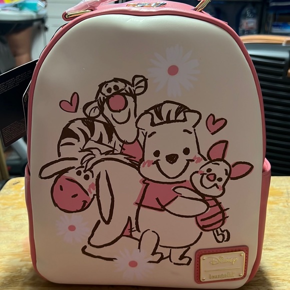Pink loungefly Winnie the Pooh backpack